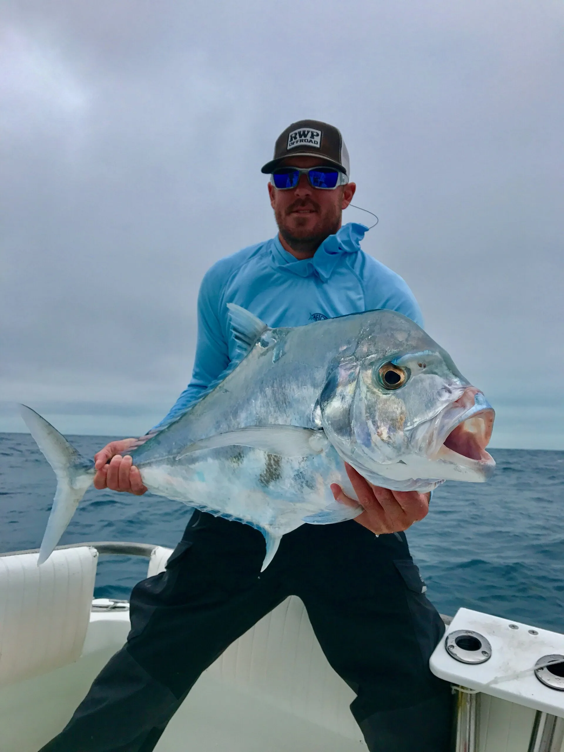 Angler with a big african pompano