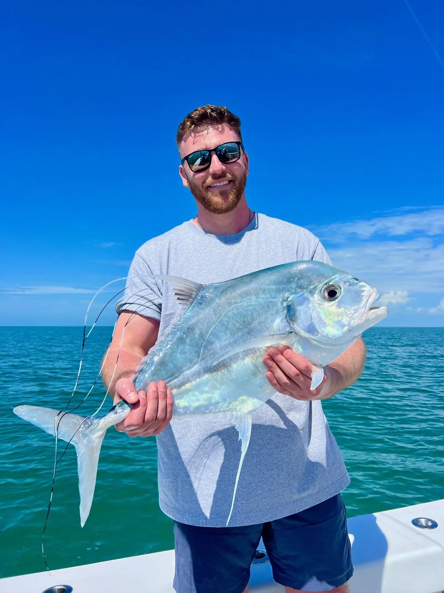 Angler with an african pompano