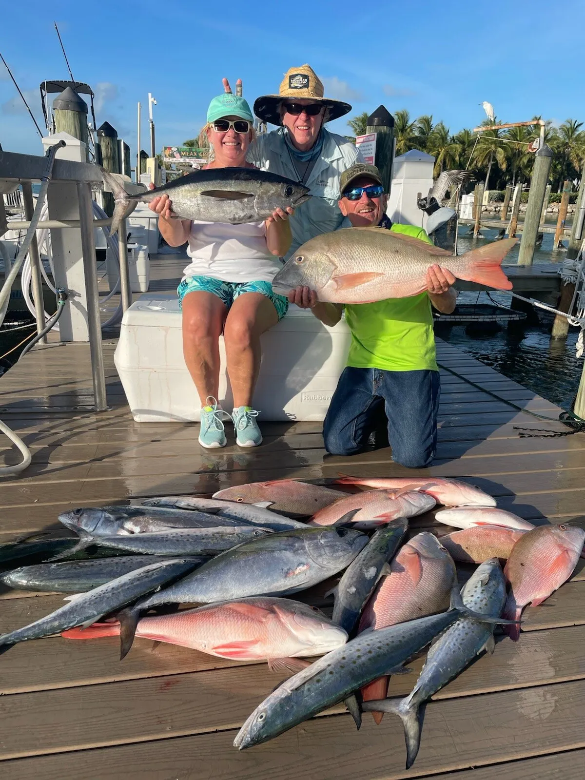 Anglers with their catch on the dock