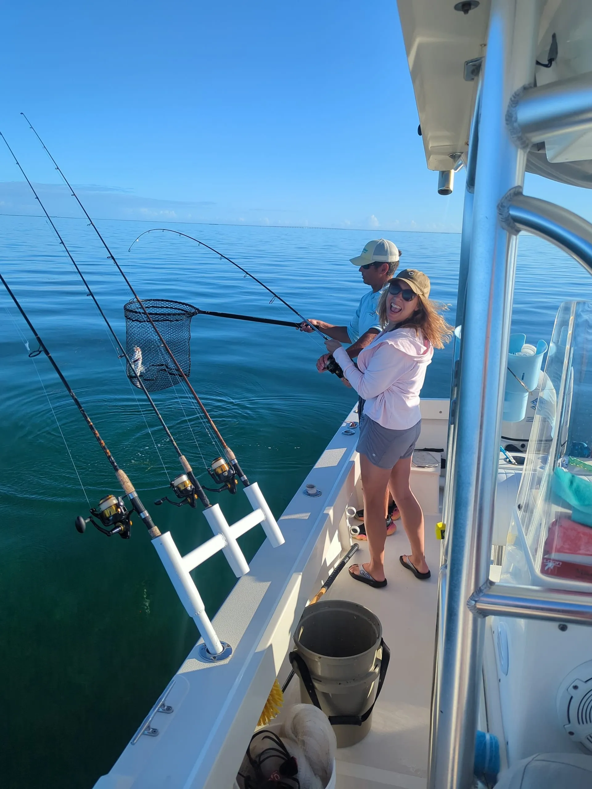 Netting a fish off the stern