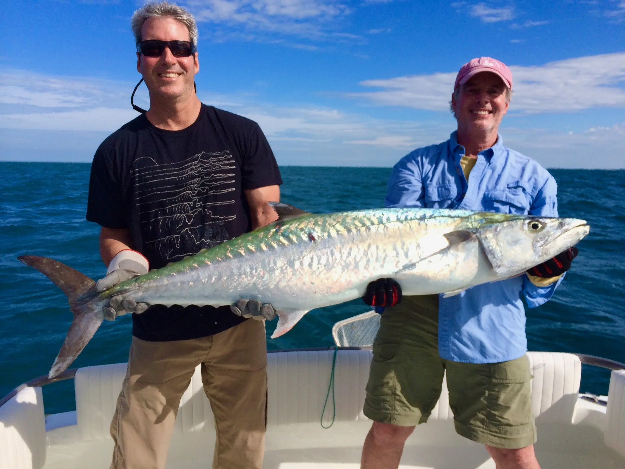 Two anglers with a kingfish